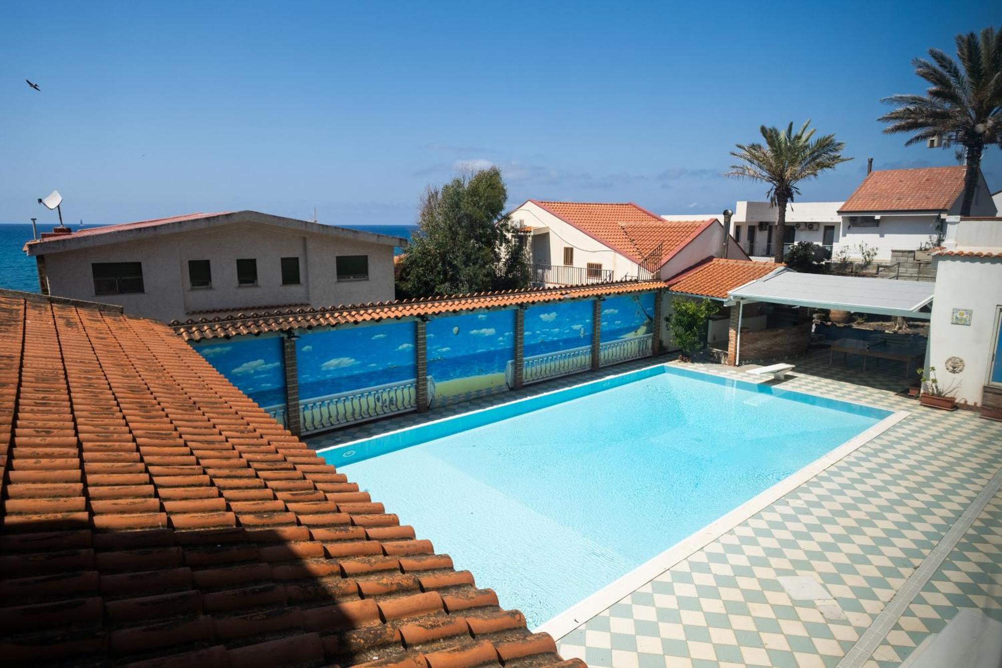 Aparthotel Oasi Azzurra Messina Exterior foto